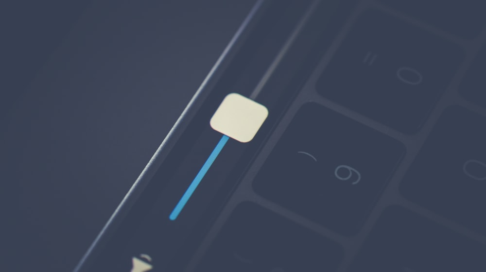 Close-up of a control being adjusted, showing interface feedback
