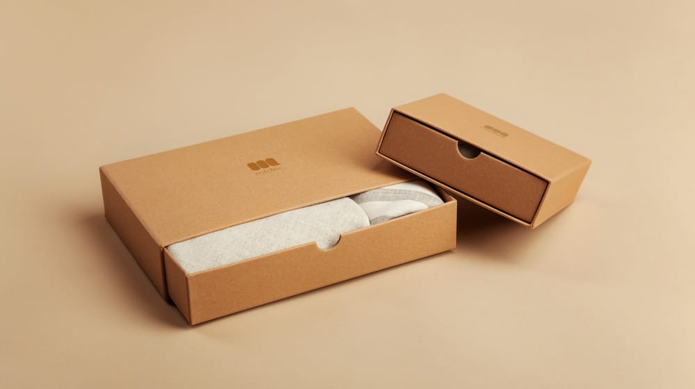 Plain cardboard shipping boxes ready to go out, whichever storefront took the order